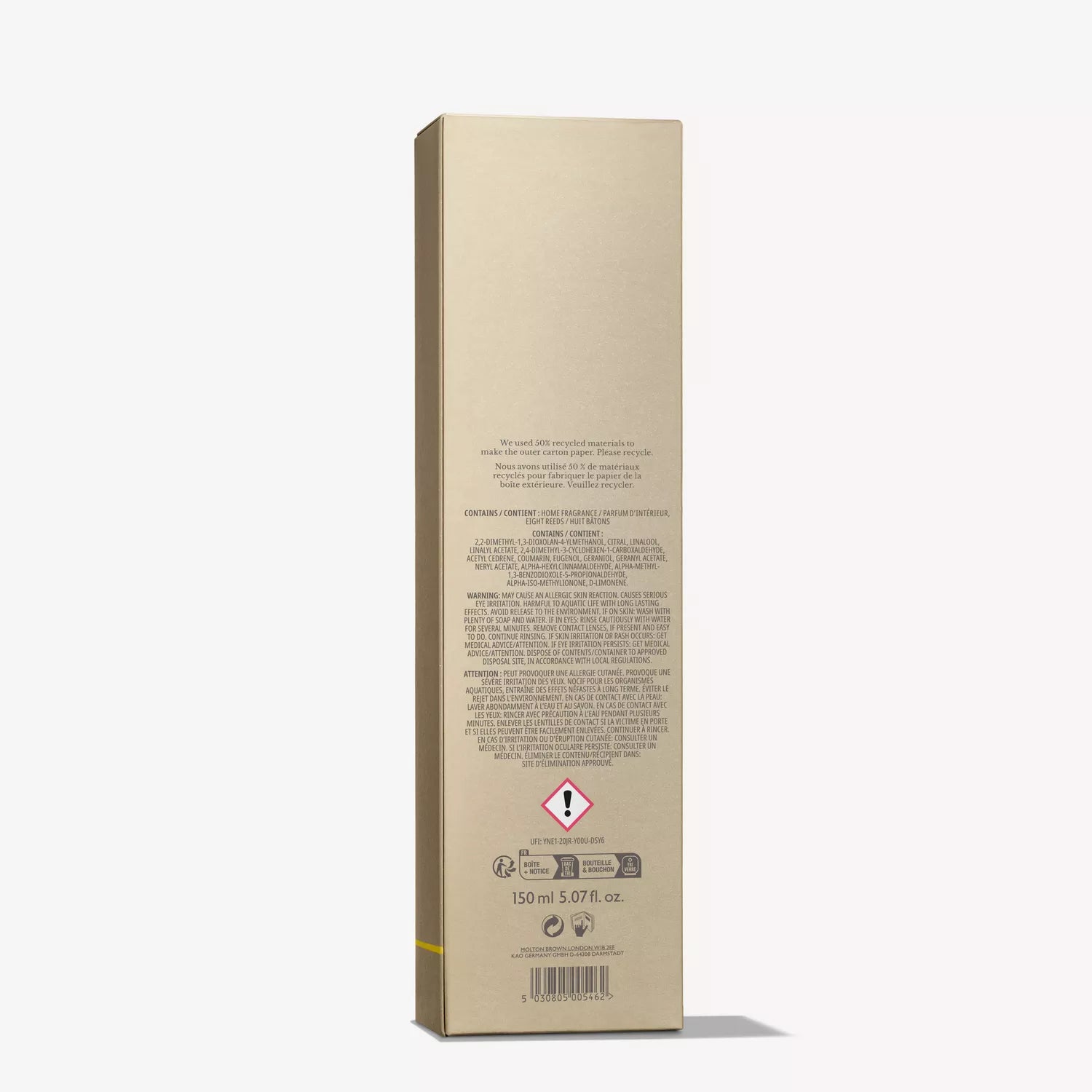 A tall, gold MoltonBrown Nederlands box stands upright with text and warnings on the back. Labeled "150g," it contains Fiery Pink Pepper Perfumed Soap with hints of zwarte peper and sheaboter.