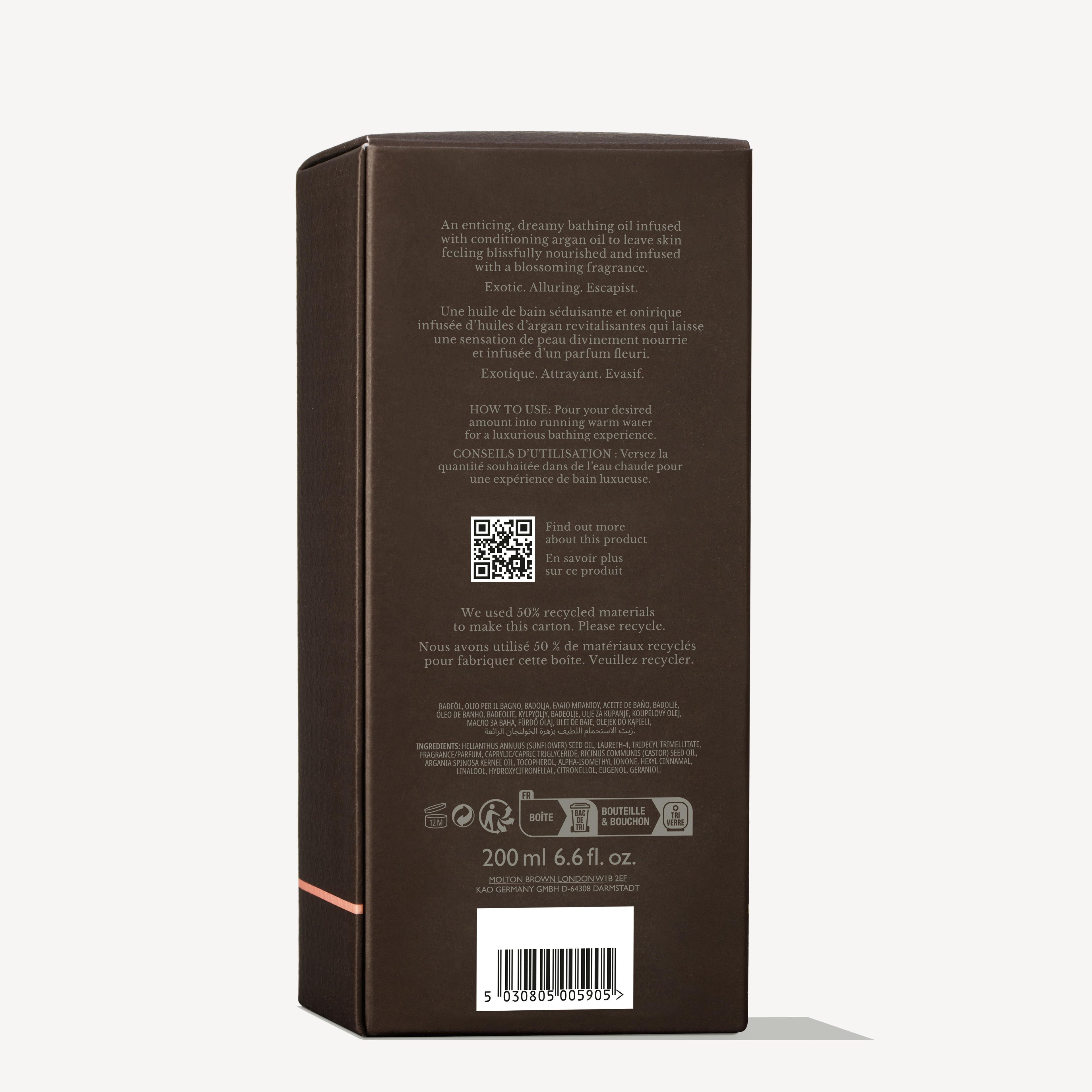 A brown rectangular box for MoltonBrown Nederlands Heavenly Gingerlily Caressing Bathing Oil 200ml displays product info, usage directions, and a QR code in English and French, states use of recycled materials, and notes the volume as 200 ml (6.6 fl. oz.).
