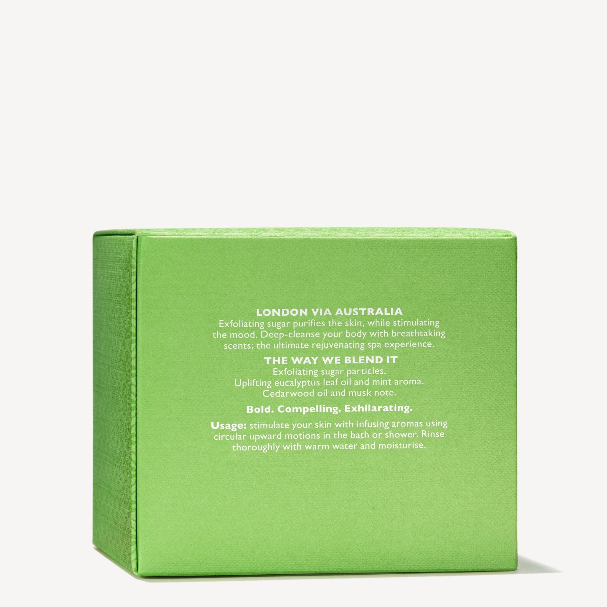 The MoltonBrown Nederlands Infusing Eucalyptus Stimulating Body Polisher 275g comes in a green box with white text and features exfoliating sugar, eucalyptus, mint, jojoba beads, and a woody-citrus scent for use in bath or shower.
