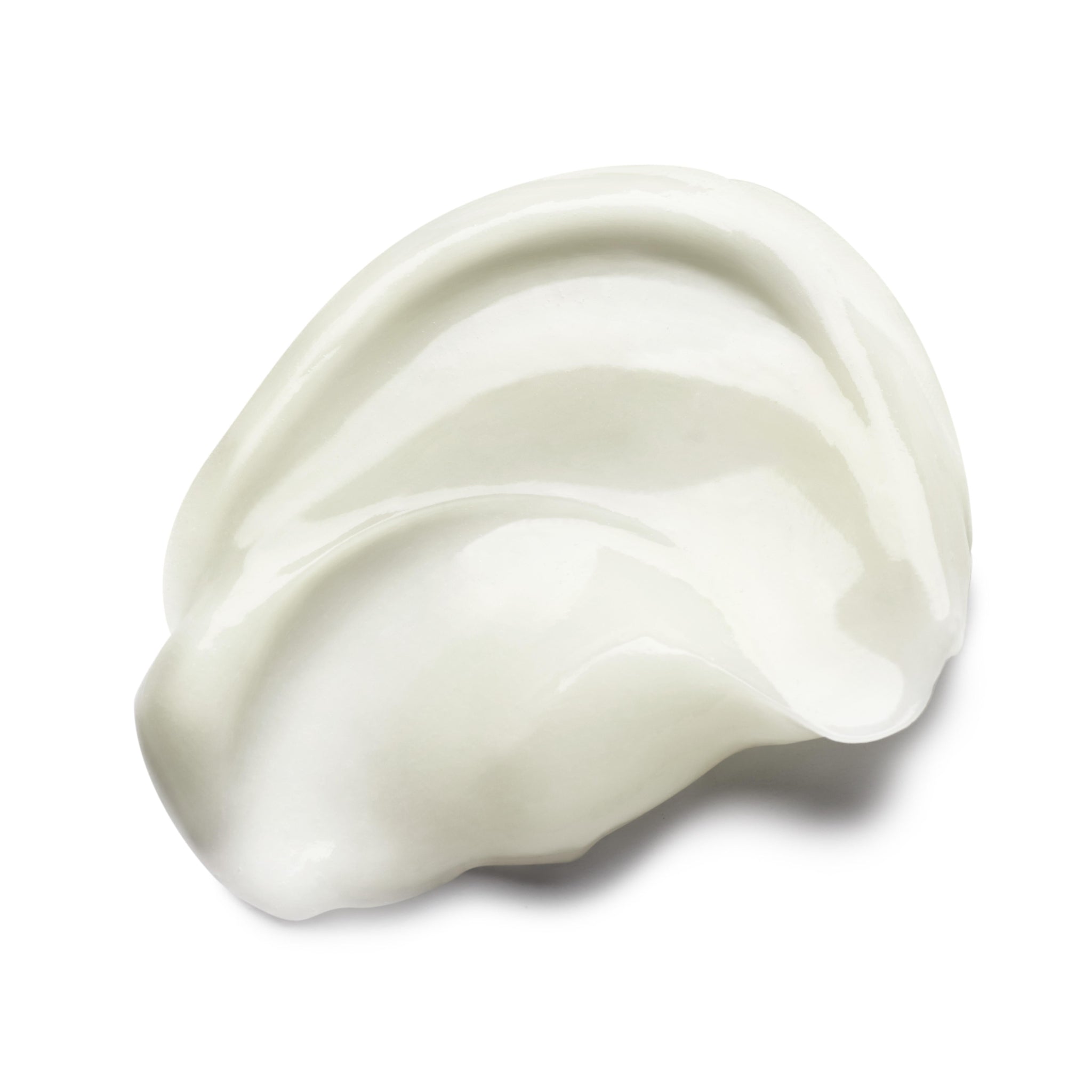 A close-up of MoltonBrown Nederlands Purifying Conditioner With Indian Cress 300ml, showing its white, creamy texture spread smoothly in a curved pattern on a white background.