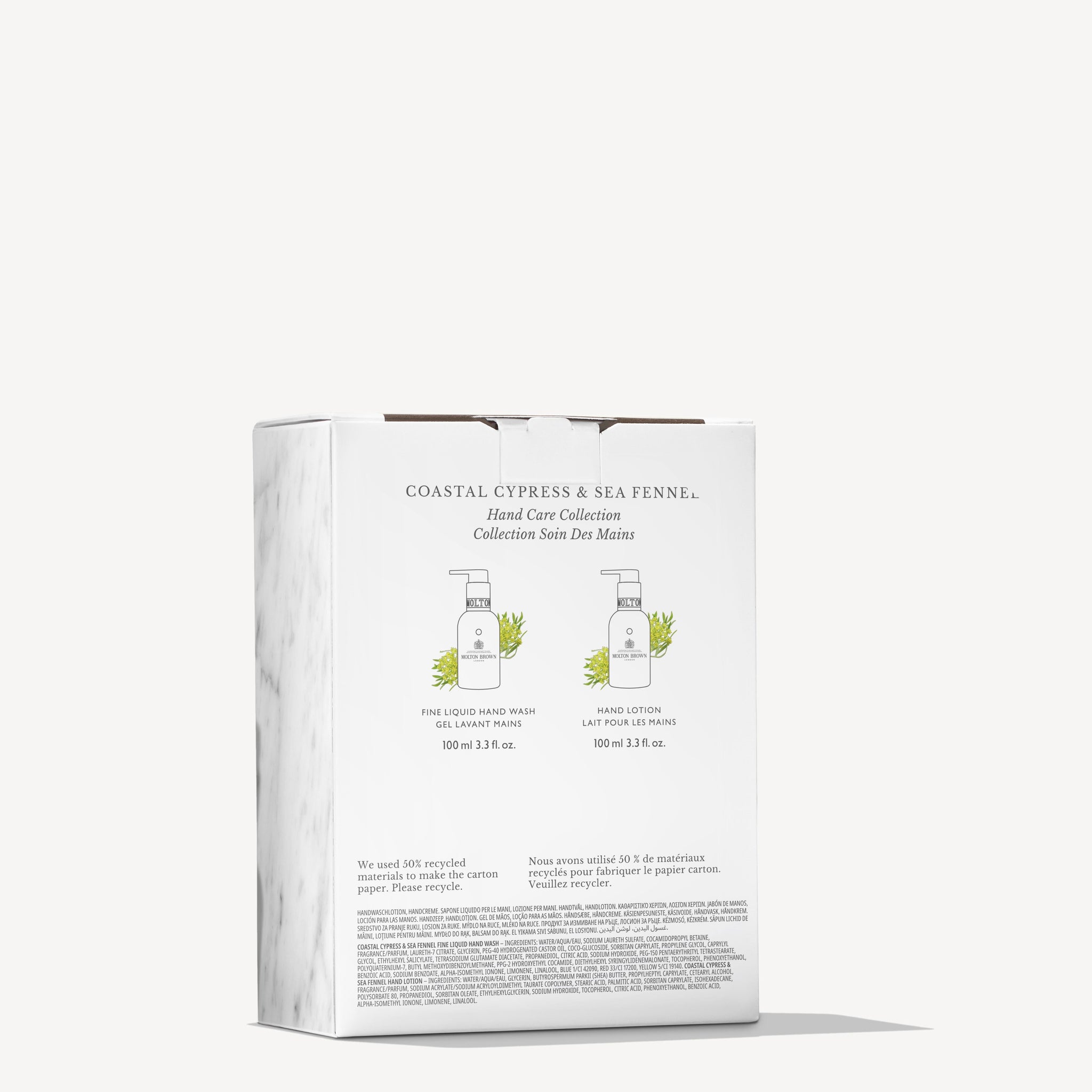 A white rectangular box labeled “Coastal Cypress & Sea Fennel Hand Verzorgingscollectie” by MoltonBrown Nederlands displays hand wash and lotion bottle illustrations along with product descriptions on a plain light background.