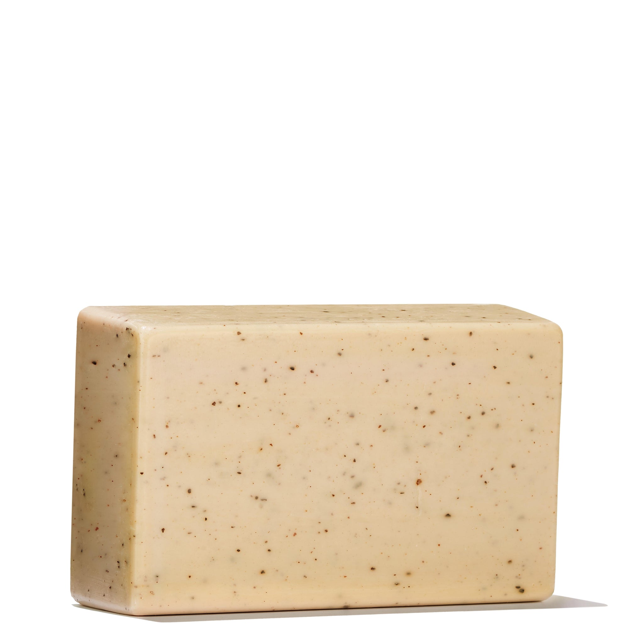 The MoltonBrown Nederlands Re-charge Black Pepper Bodyscrub Bar 250g is a rectangular beige scrub bar with fine brown jojoba korrels, shown against a white background.