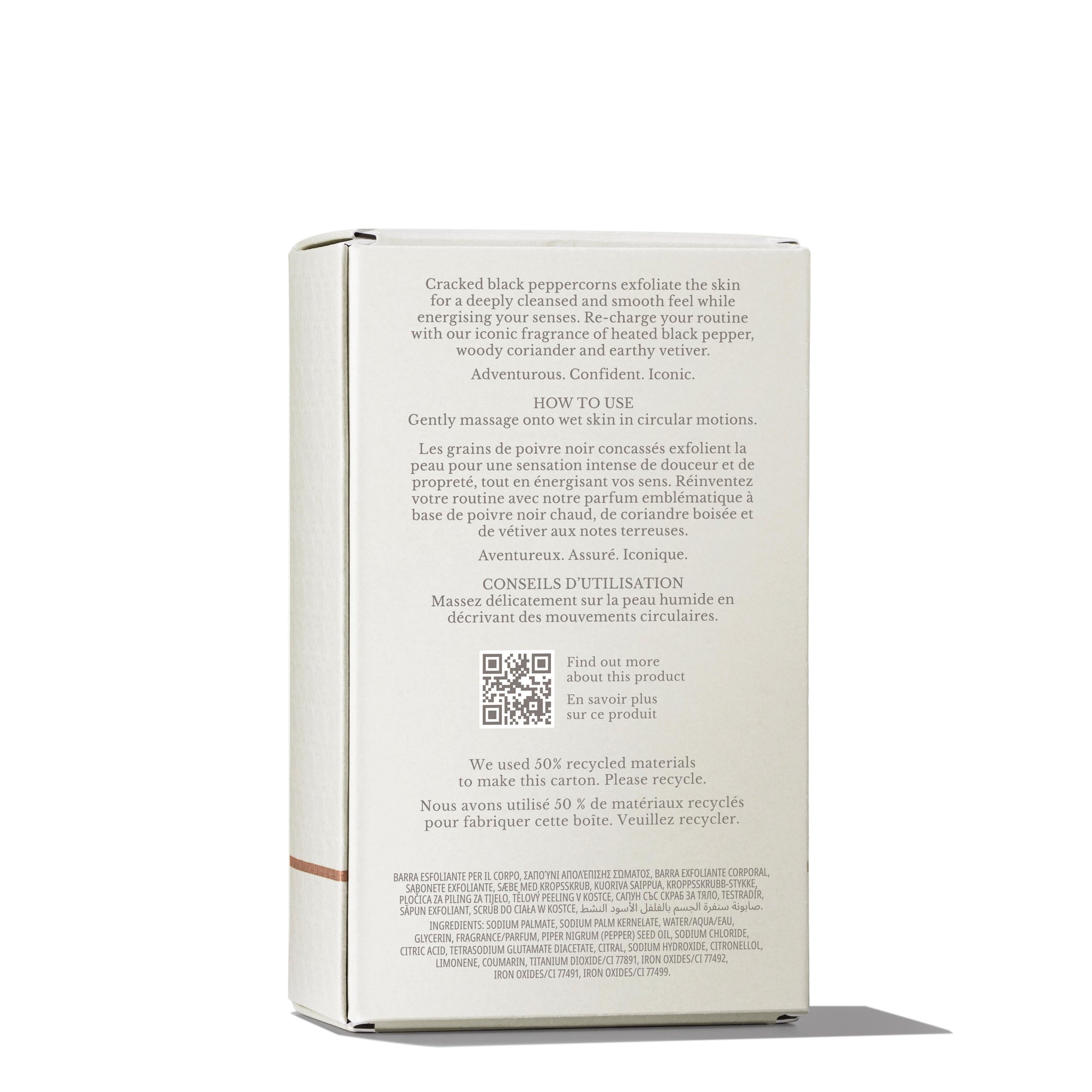 A beige MoltonBrown Nederlands Re-charge Black Pepper Bodyscrub Bar 250g box stands upright, featuring exfoliating details with cracked black peppercorns, jojoba beads, nourishing oils, and bilingual use, recycling, and ingredient information.