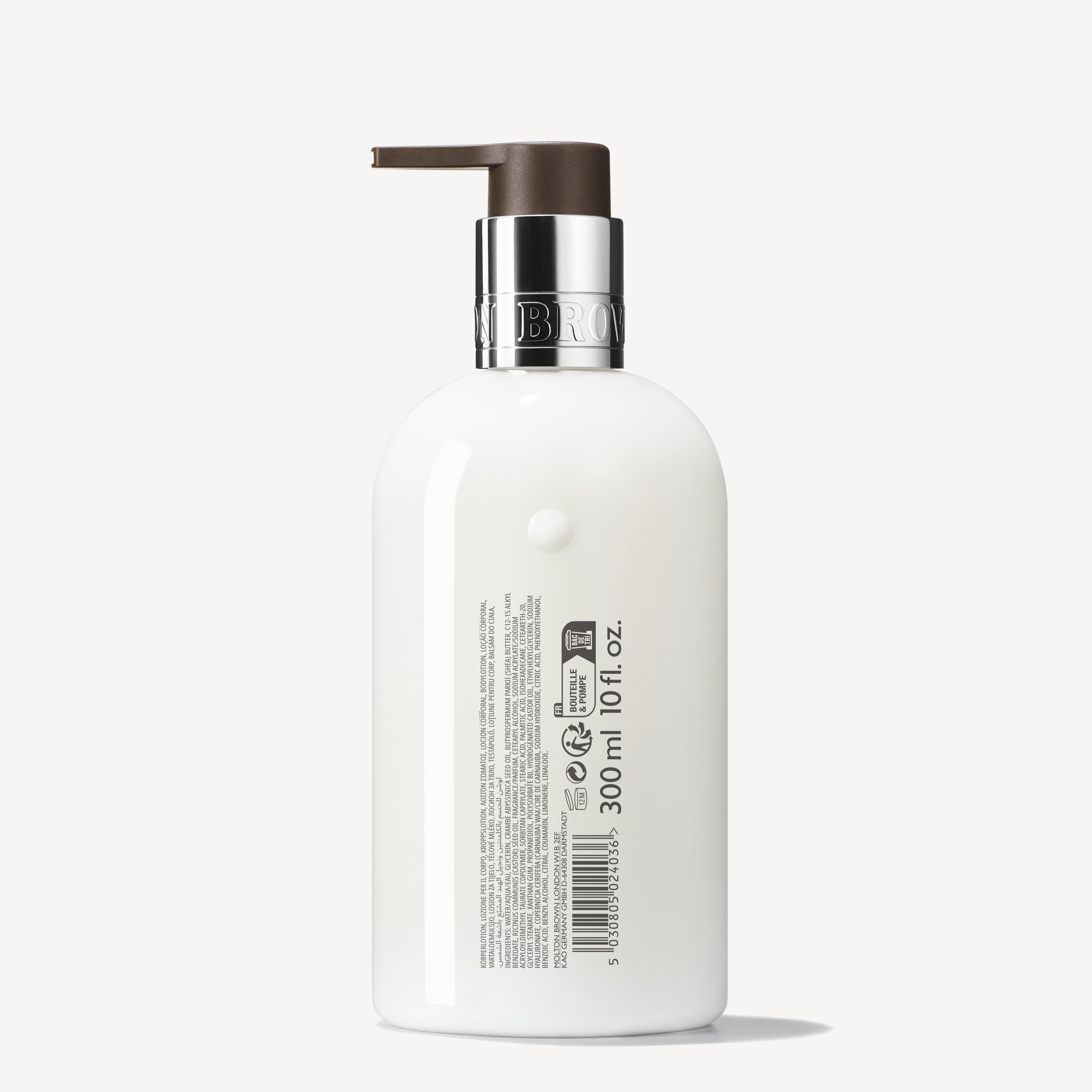 A white 300ml MoltonBrown Nederlands Sunlit Clementine & Vetiver Bodylotion bottle with a black pump and silver collar, product info and barcode on the back, set against a plain white background. Fragrance notes: clementine and vijgenbladeren.