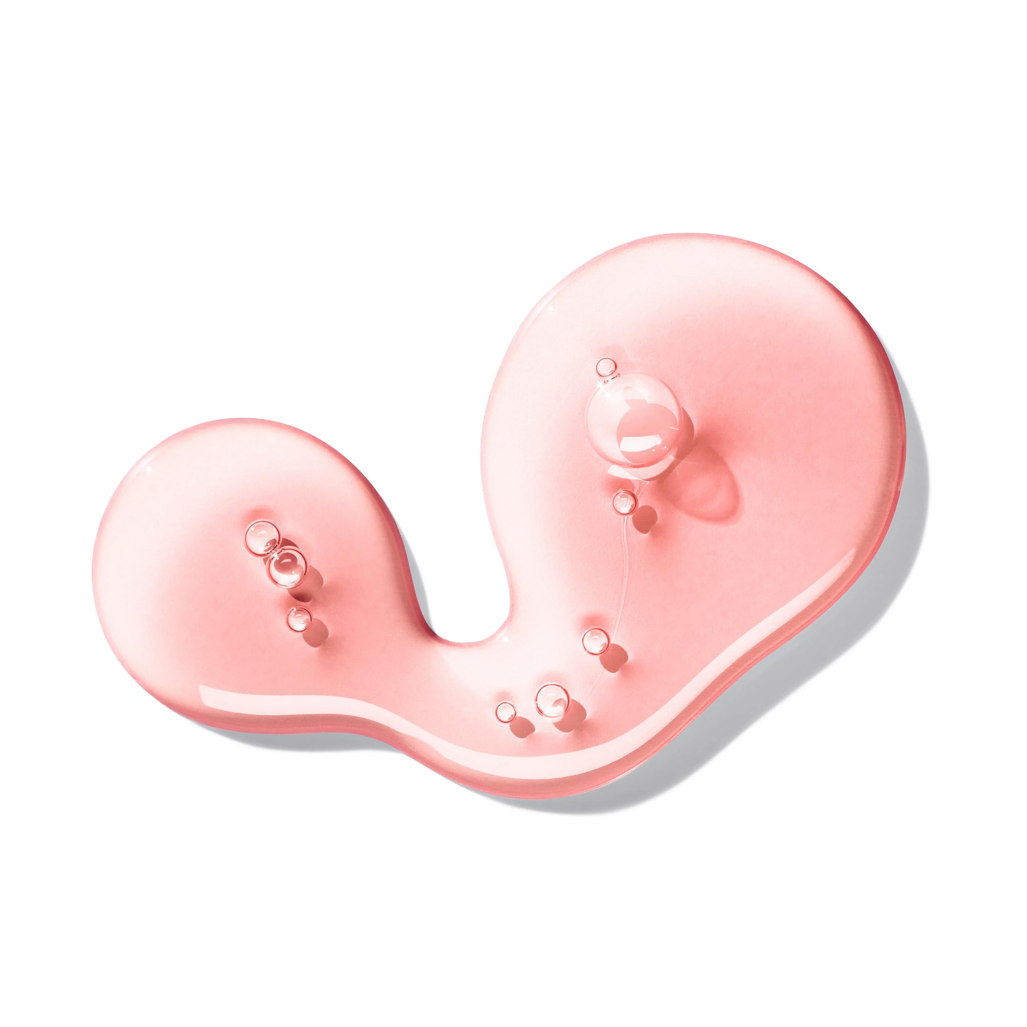 A pink, glossy liquid with tiny bubbles forms a curved blob on white, capturing the fresh bloemig-fruitig essence of MoltonBrown Nederlands Delicious Rhubarb & Rose Vloeibare Handzeep 300ml.