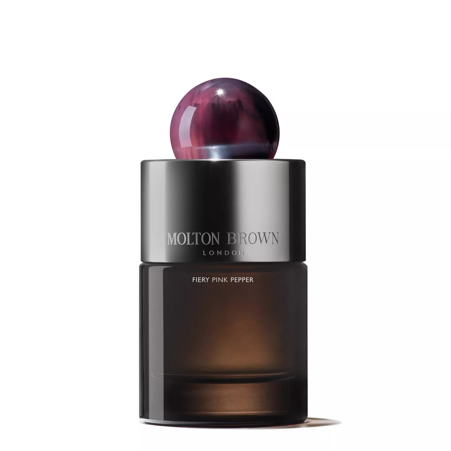 A sleek, dark glass 100ml bottle of MoltonBrown Nederlands Fiery Pink Pepper Eau de Parfum features a shiny metallic cap with a marbled pink and purple sphere, set against a white background.