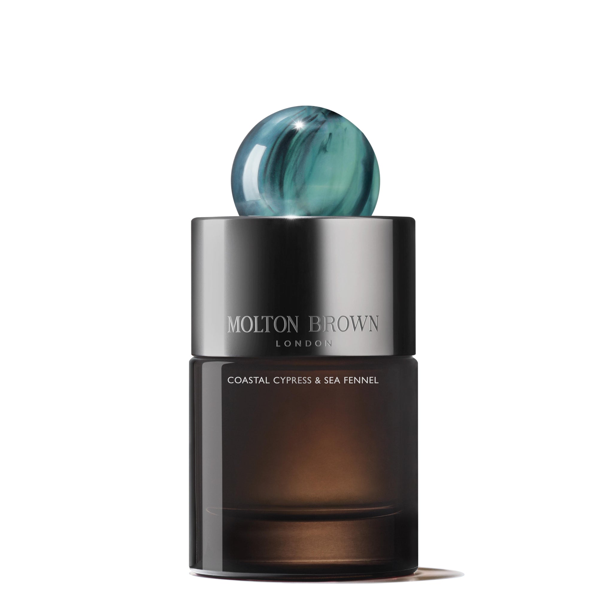 A stylish MoltonBrown Nederlands Coastal Cypress & Sea Fennel Eau de Parfum 100ml bottle features a dark glass base, silver cap, and round blue-marble top, displayed against a white background.