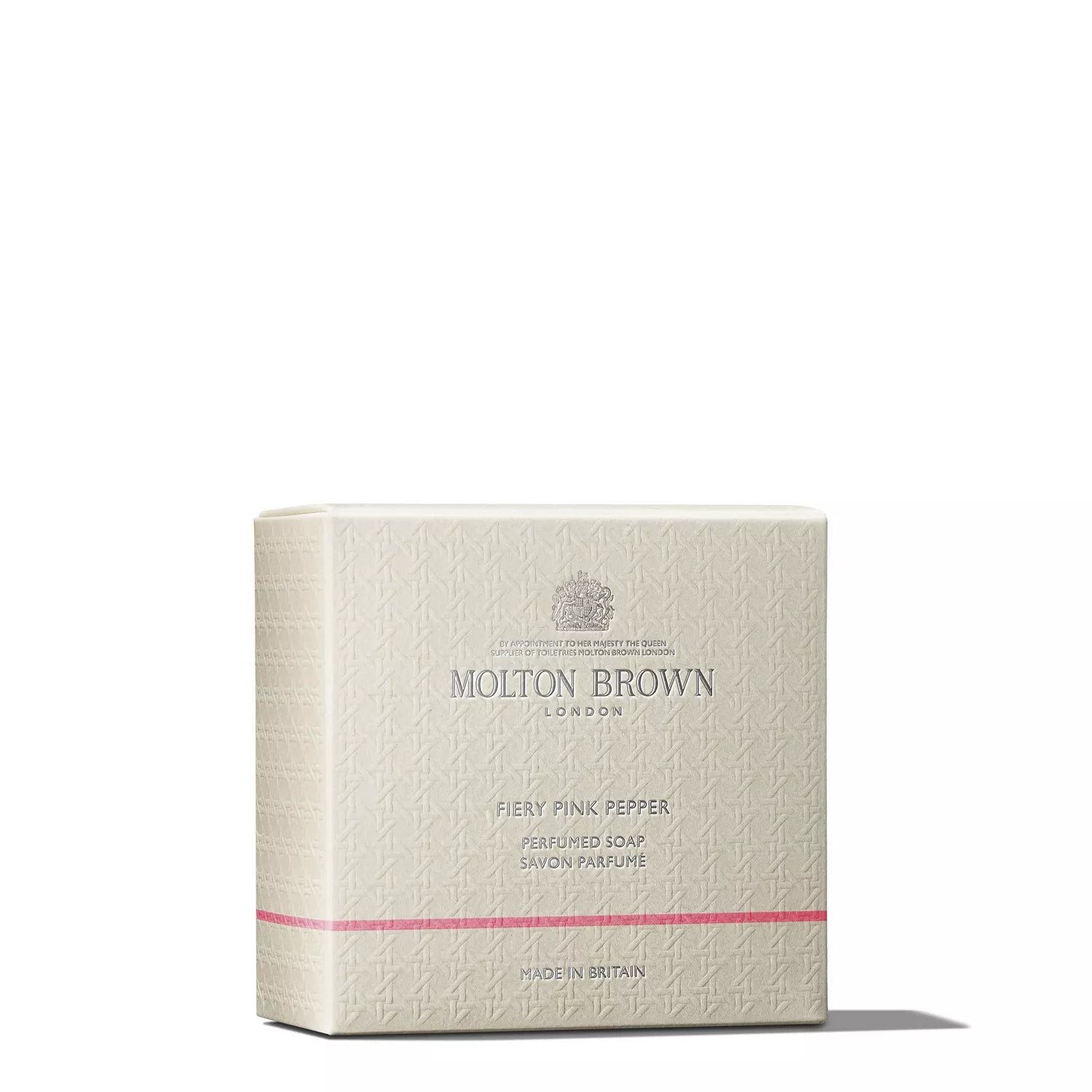 A beige box of MoltonBrown Nederlands Fiery Pink Pepper Perfumed Soap 150g, featuring textured patterns, silver text, and a pink line at the bottom, is displayed against a plain white background.