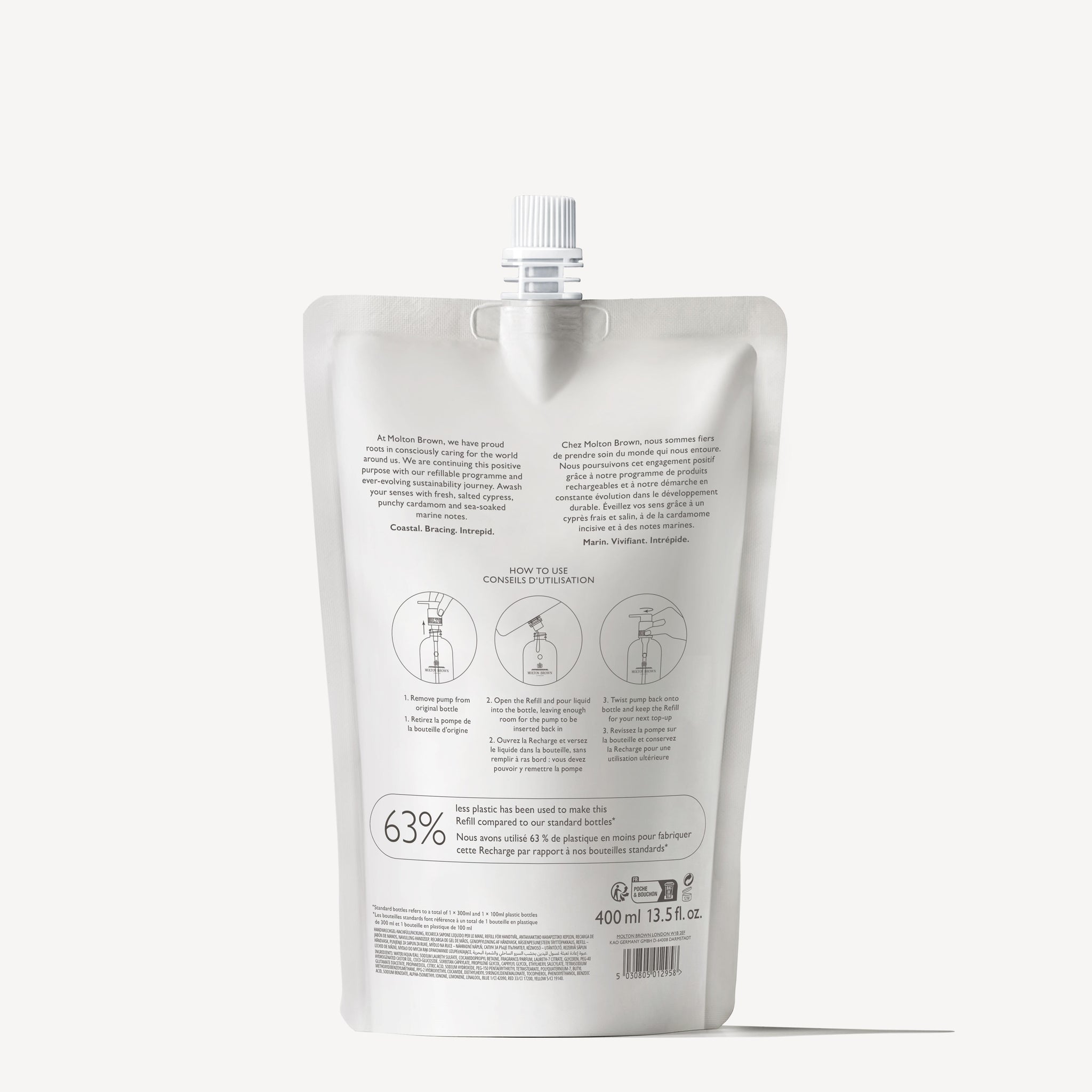 The MoltonBrown Nederlands Coastal Cypress & Sea Fennel Vloeibare Handzeep Navulling 400ml is a white, stand-up pouch with spout cap, gray text and diagrams on the back; it's milieuvriendelijk and offers an aromatische geur.