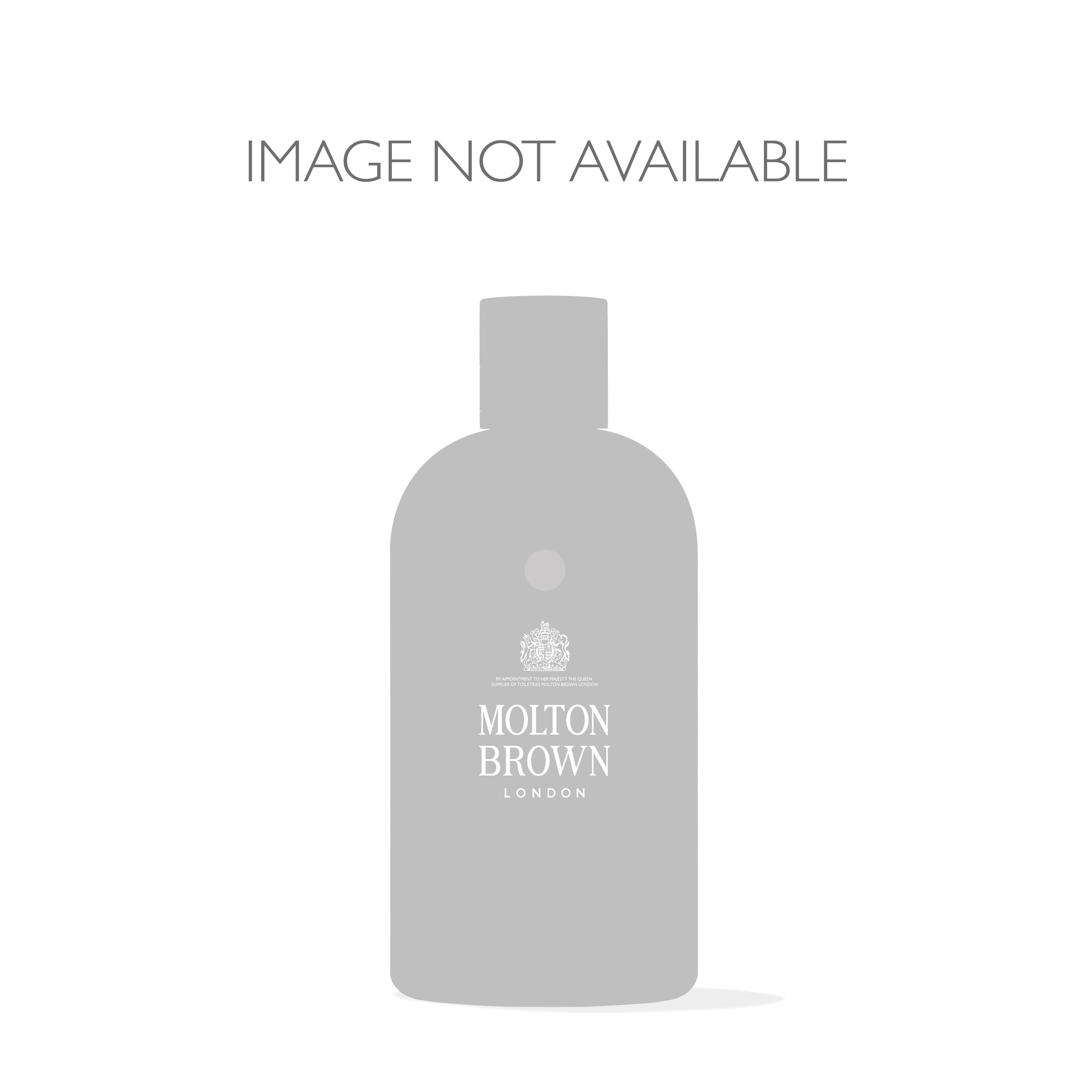A placeholder image features "IMAGE NOT AVAILABLE" above a bottle labeled MoltonBrown Nederlands Heavenly Gingerlily Handcrème 40ml. The grayscale, minimalistic design suits products with gingerlily scents.
