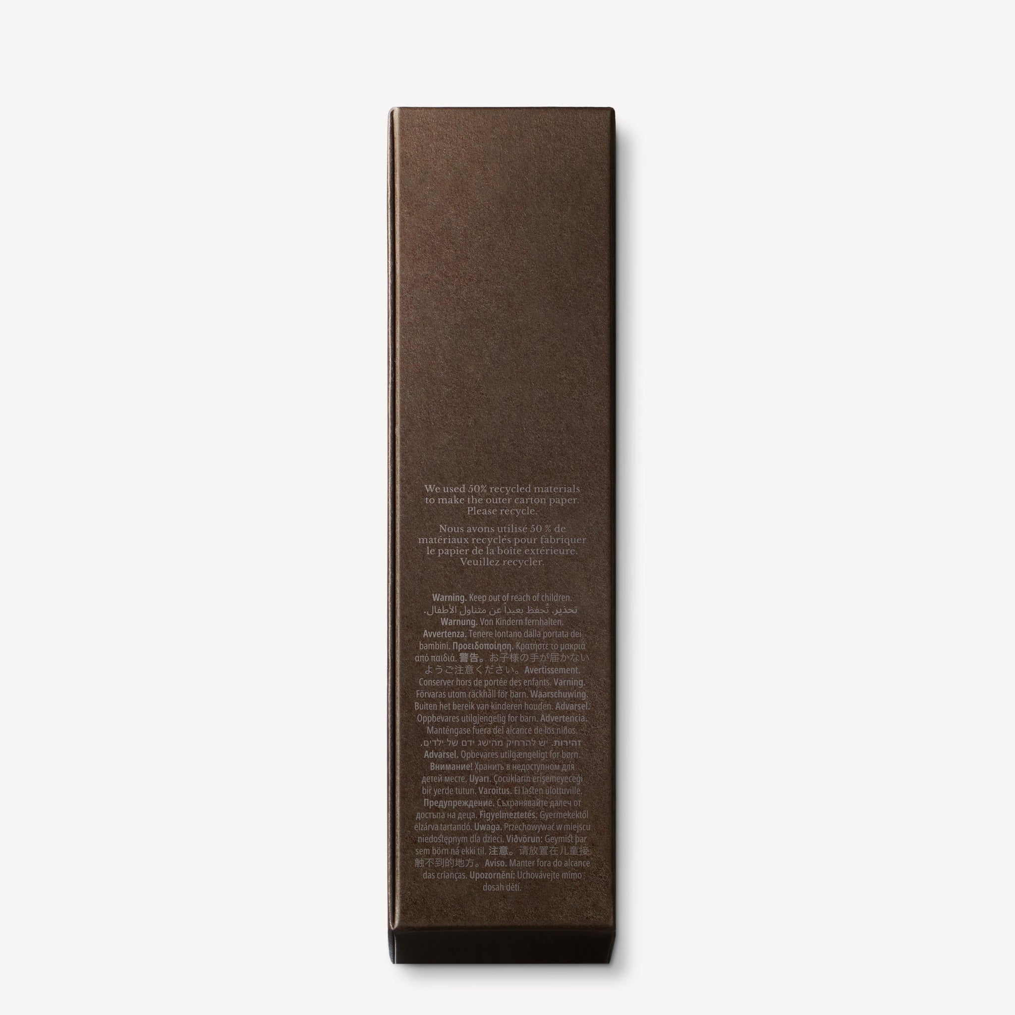 A brown rectangular box with white text from MoltonBrown Nederlands, perfect for storing your Wick Trimmer 72g or other candle accessories.